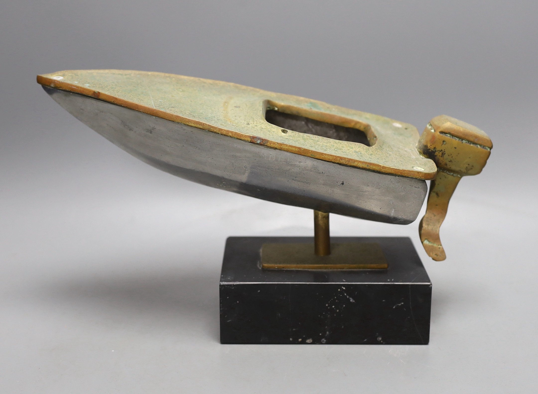 A brass and aluminium model of a speedboat on marble base, 30cm